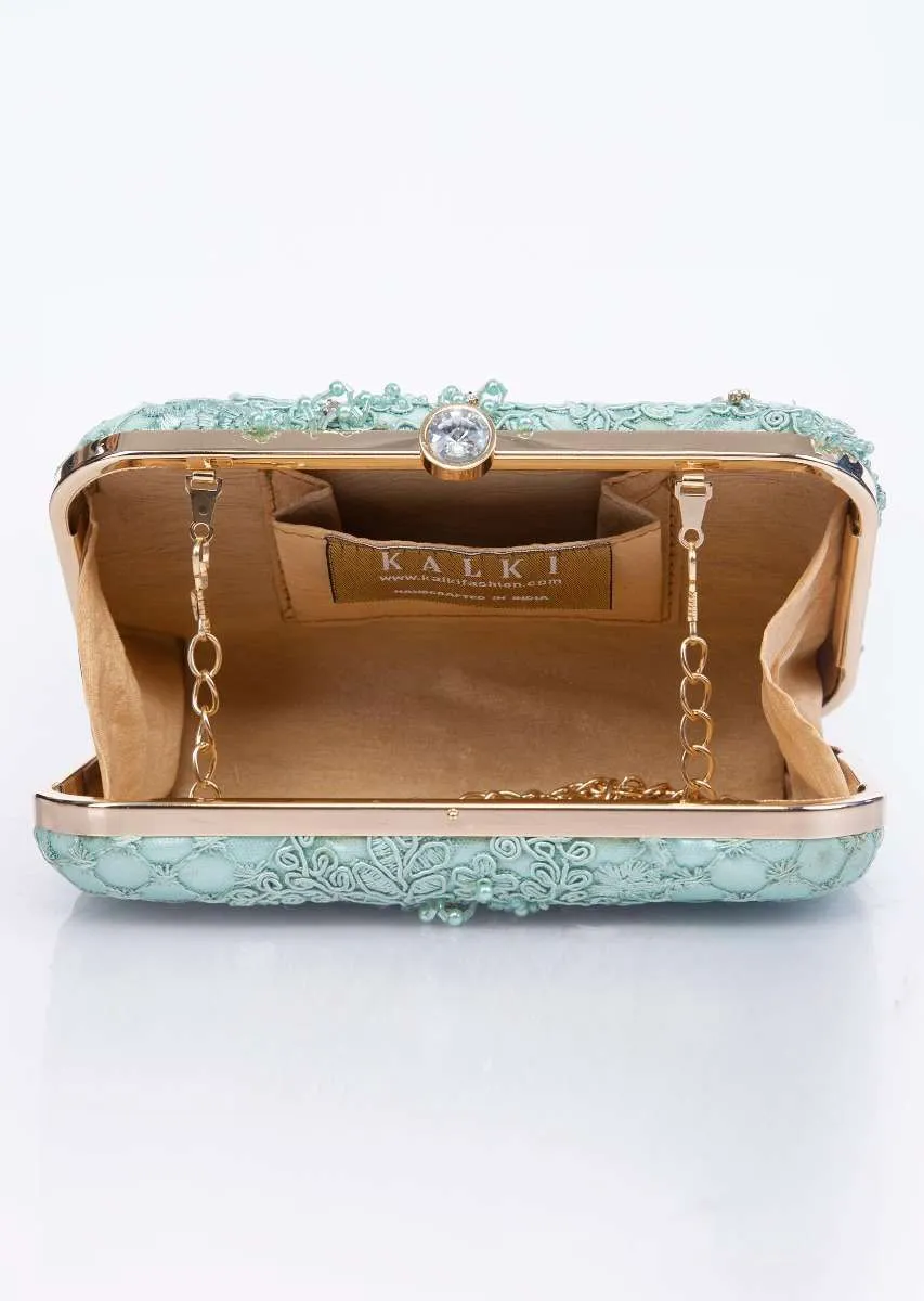 Mint green clutch with self cord, moti, cut dana and resham embroidery only on Kalki