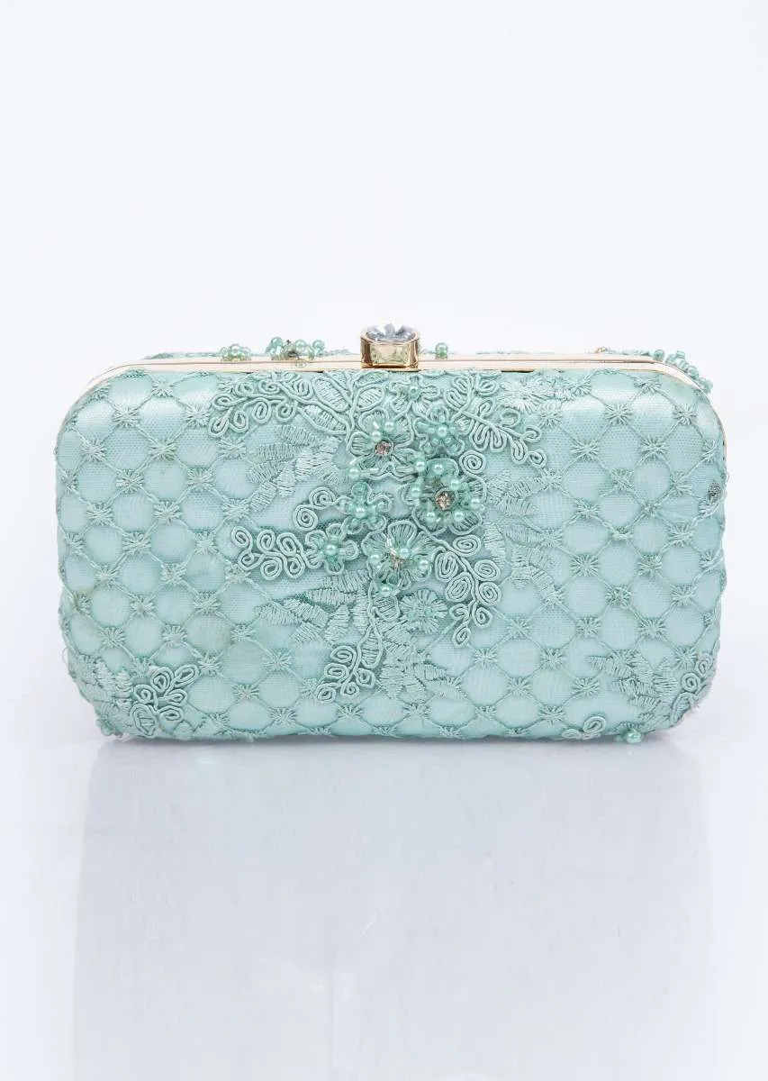 Mint green clutch with self cord, moti, cut dana and resham embroidery only on Kalki